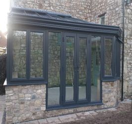 Anthracite grey conservatory with glass roof