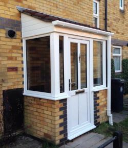 White PVCu Porch with tiled roof