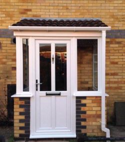 White PVCu Porch with tiled roof